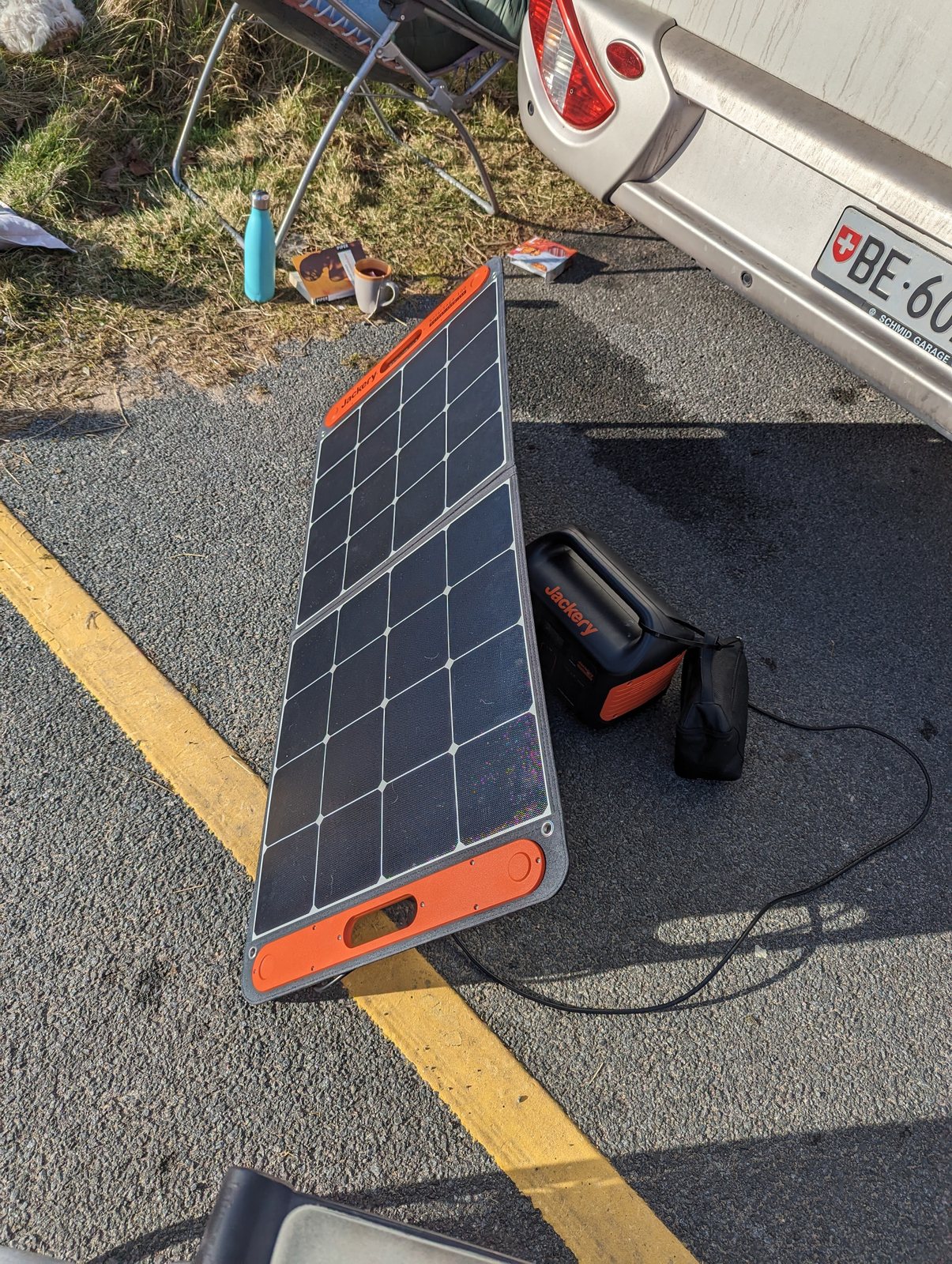 The full off-grid power setup beside the campervan.