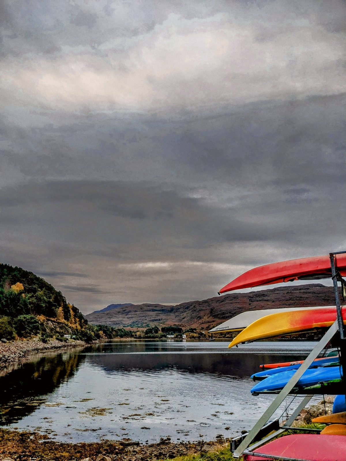 Kayaks by the harbour at Shieldaig.