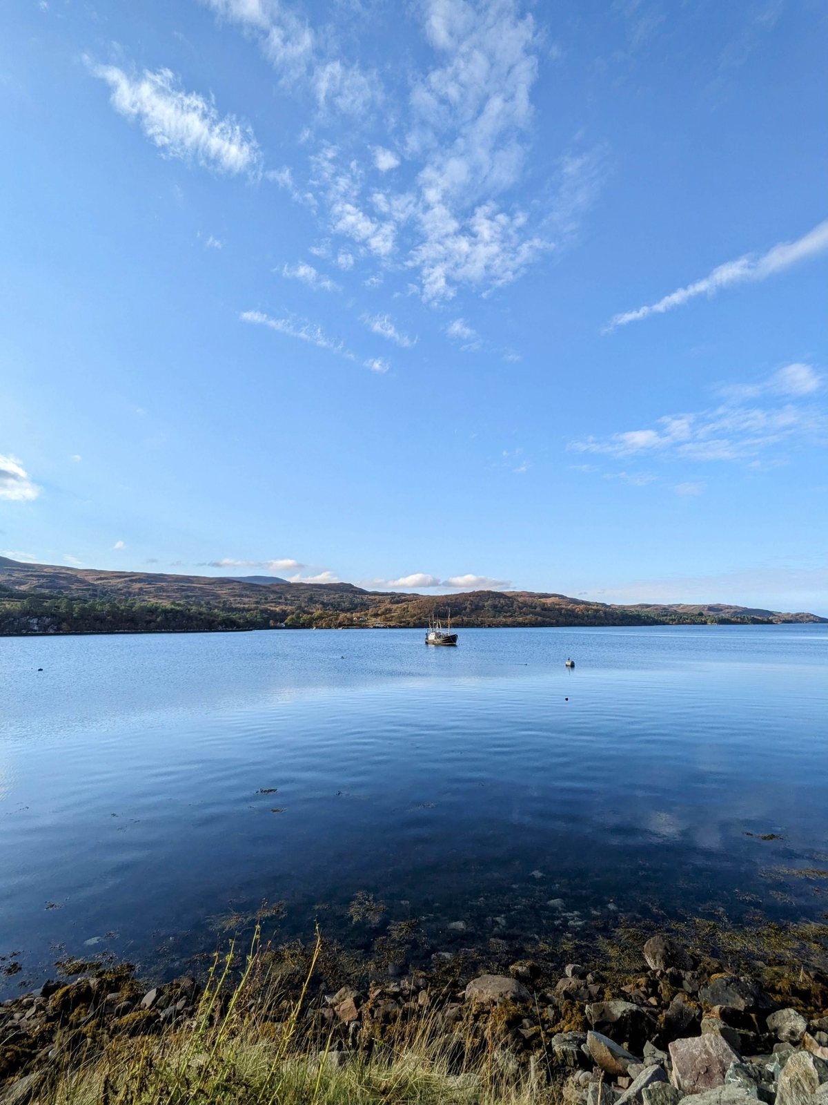 Mirror-calm Loch Shieldaig with islands.