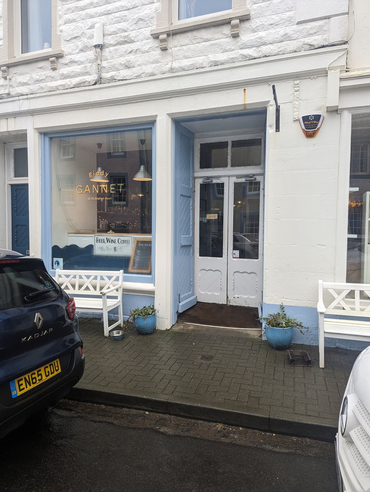 The white frontage of a cafe on the front at St Monans.