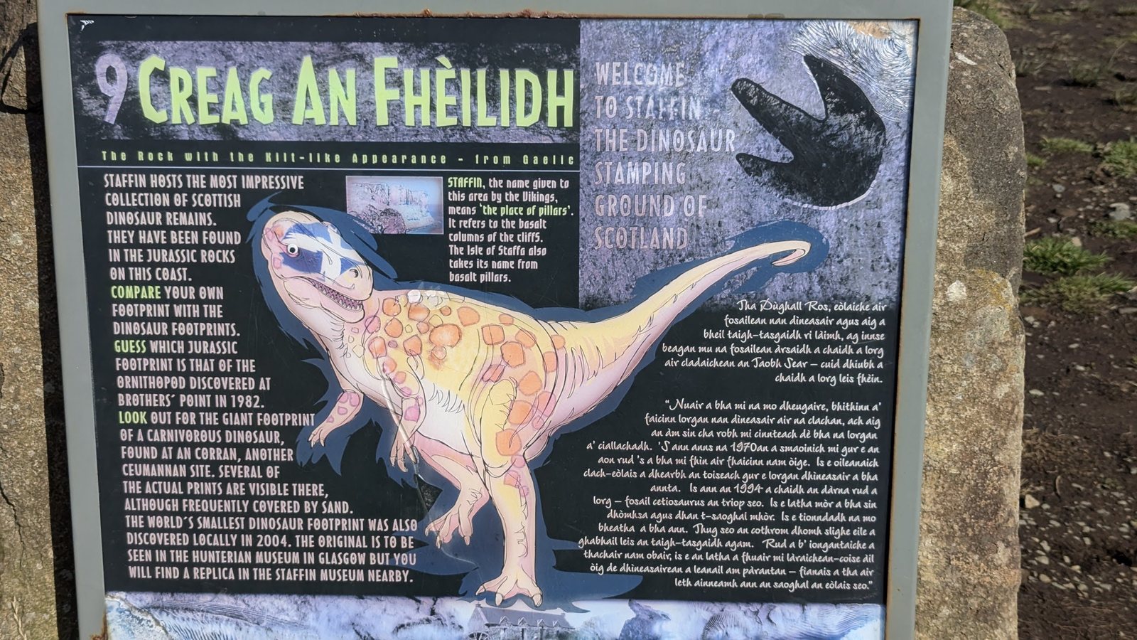 An interpretation board about dinosaur footprints at Staffin.
