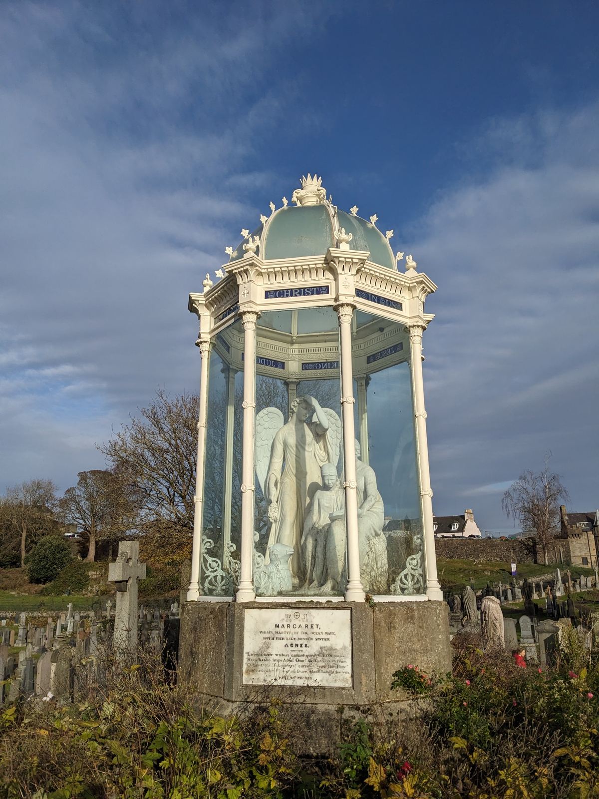 The glass-domed marble Wigtown Martyrs' Monument in Stirling's Valley Cemetery, a sculpted group of figures under a canopy.