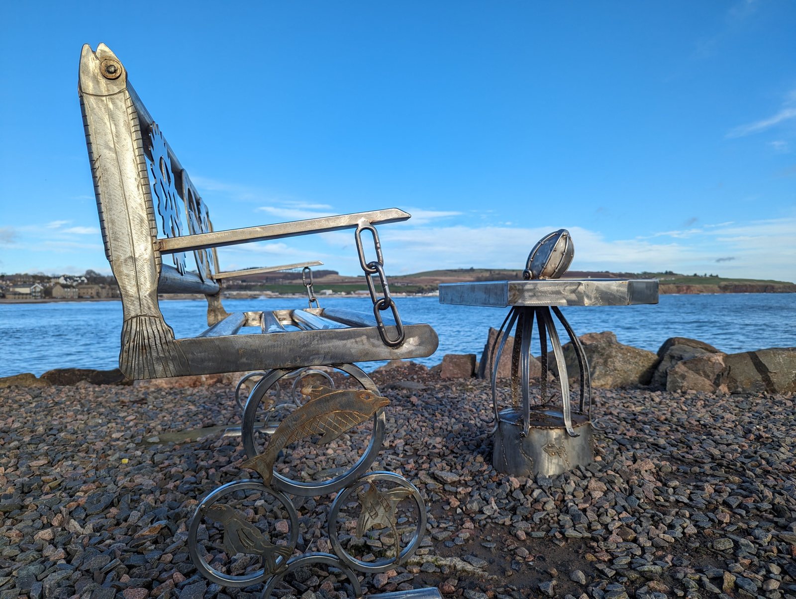 A tall metal fish sculpture on the Stonehaven boardwalk.