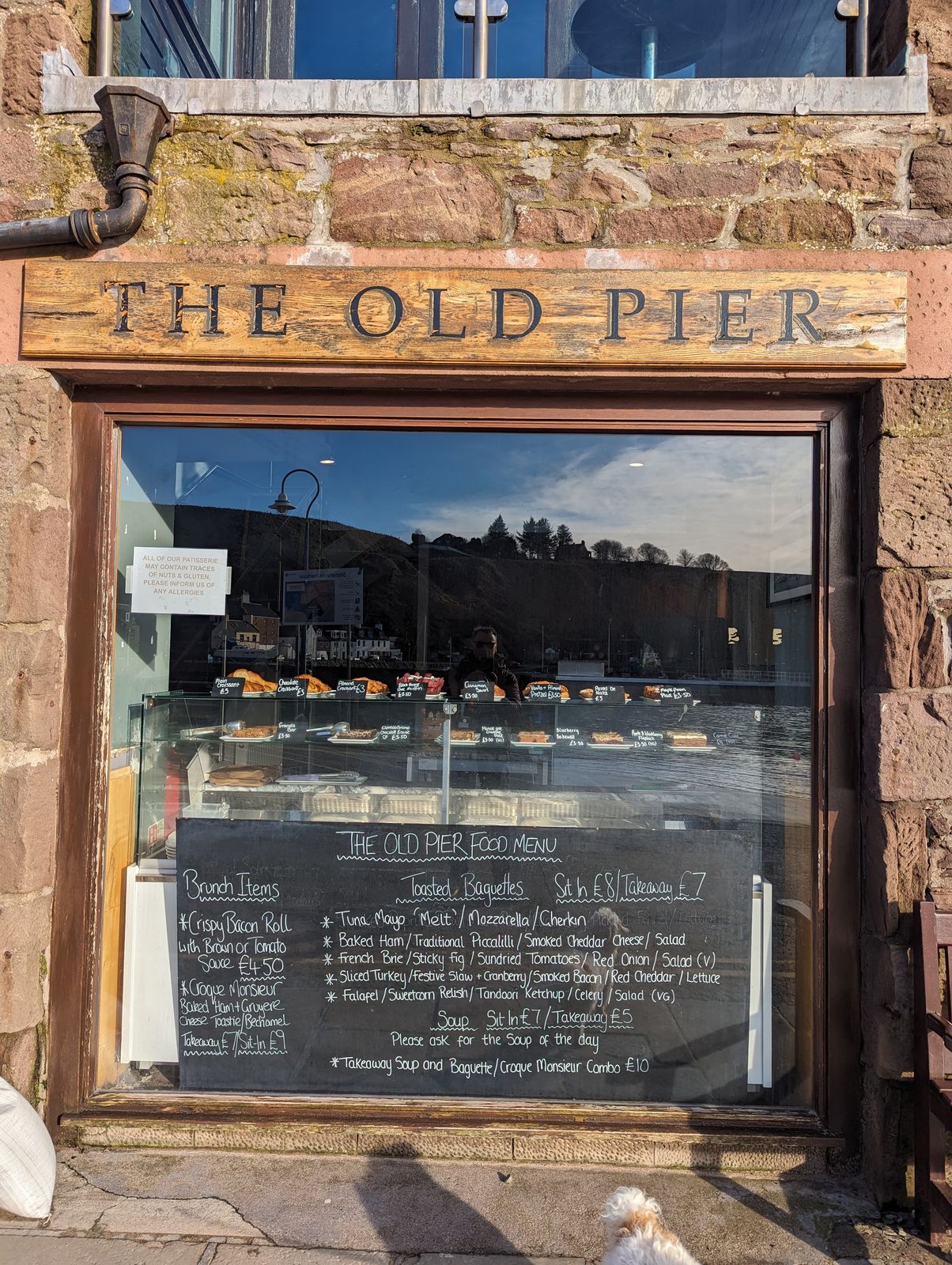 The Old Pier seafood restaurant window at Stonehaven harbour.