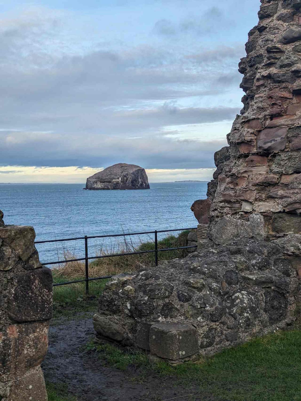 The ruined towers of Tantallon Castle above the green courtyard.