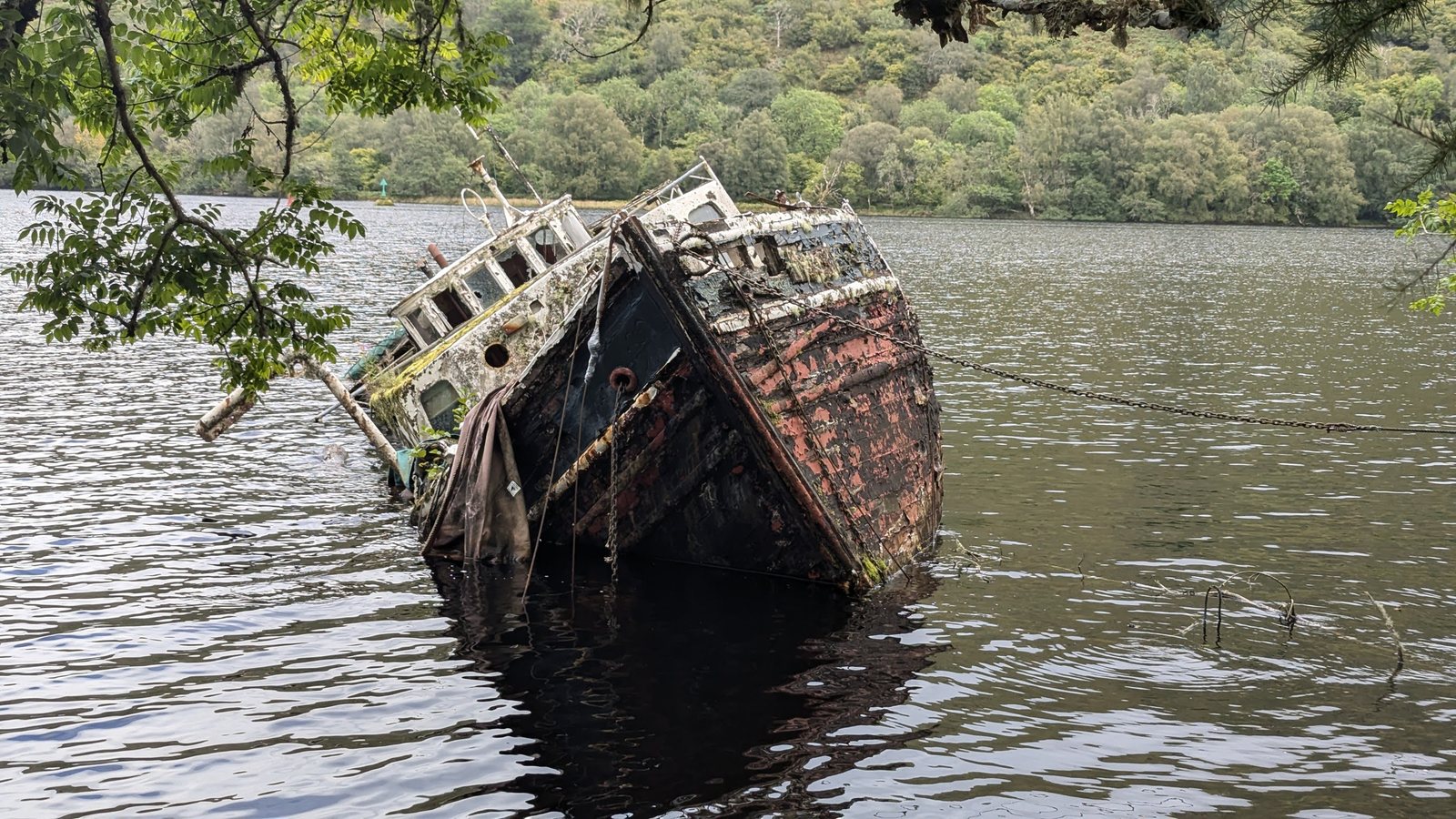 An old boat wreck in the shallows of Loch Oich